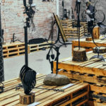 L’esposizione di oggetti realizzati in ferro battuto nei locali dell’ex Lanificio in occasione della XXIII Biennale di Arte Fabbrile a Stia
